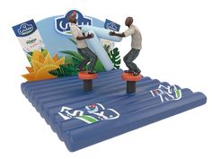 two men on skateboards performing tricks in front of an advertisement sign for the rio olympics