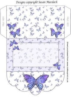 an envelope with blue butterflies on the front and back, in white paper cut out to look like it has been folded