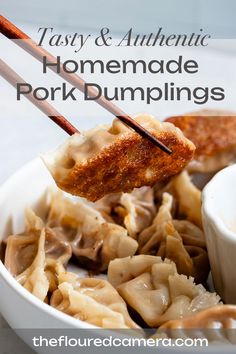 homemade pork dumplings in a white bowl with chopsticks sticking out of them