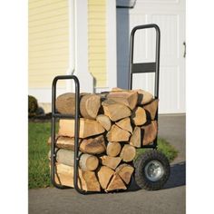 a stack of logs sitting on top of a dolly