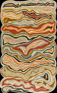 a multicolored area rug with wavy lines on the top and bottom of it