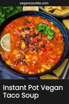 instant pot vegan taco soup in a bowl with tortilla chips on the side