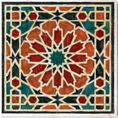 an intricately designed tile in red, green and blue