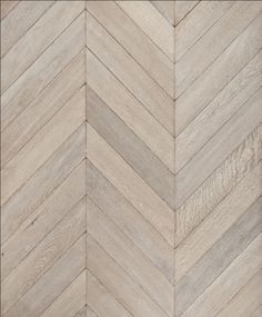 an image of wood flooring that looks like chevron herringbones in grey tones