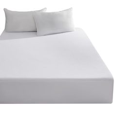 an image of a bed with white sheets and pillows on the bottom half, side view