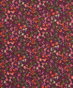 an image of a red and green floral pattern on purple groundcloth with small flowers in the center