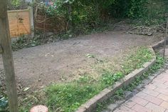 an empty backyard with no grass or plants in it, before and after the renovation