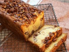 two slices of pecan bread on a cooling rack