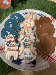 some baseball themed cookies on a plate