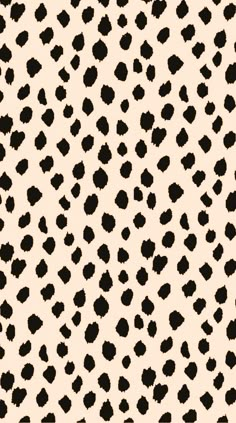 a black and white pattern with spots