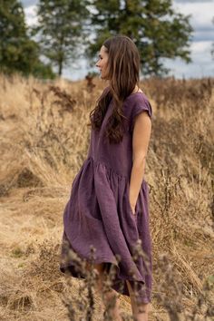 A woman in a rye field wearing shadow purple linen dress. Midi Spring Dress, Slim Your Legs, Womens Linen Clothes, Purple Linen Dress, Not Perfect Linen, Spring Midi Dress, Mock Dress, Linen Wrap Dress, Loose Midi Dress