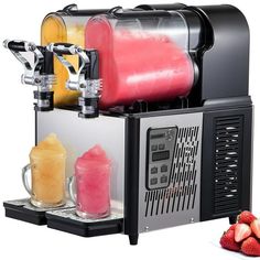 a machine that is filled with drinks and strawberries next to some other items on the table