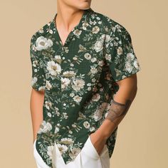 Introducing our Hawaiian Shirt for men, featuring vibrant floral patterns and a comfortable button-up design, perfect for the travel-loving boho enthusiast. This retro vacation wear blends style and comfort effortlessly, making it an ideal casual button-down choice for those seeking laid-back charm with a touch of nostalgia. 𝐃𝐄𝐓𝐀𝐈𝐋𝐒 🌼95% Polyester | 5% Spandex 🌼Boxy fit, straight cut 🌼Runs large, check your measurements against size chart 🌼Includes Chest Pocket 🌼Colors may appear dif Green Hawaiian Shirt With Camp Collar For Spring, Green Buttoned Camp Shirt For Vacation, Green Printed Camp Shirt For Spring, Floral Print Cotton Hawaiian Shirt, Relaxed Fit Floral Print Hawaiian Shirt, Green Hawaiian Shirt For Spring, Green Floral Print Hawaiian Shirt For Summer, Green Floral Print Camp Shirt For Spring, Green Hawaiian Shirt With Button Closure For Spring