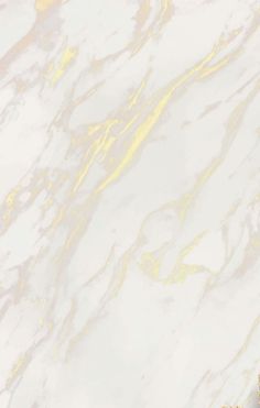 an abstract marble background with gold and white colors