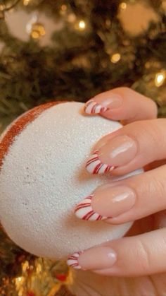 Christmas Acrylics Short Almond, Nails Cute Christmas, Peppermint Tip Nails, Chirmast Nails, Christmas Nail Ideas Holiday French Tips, Peppermint Nails Acrylic, Gingerbread French Tip Nails, Christmas Nail Almond, Peppermint French Tip Nails