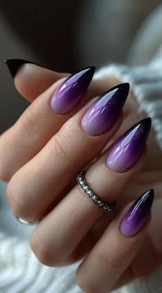 Explore the latest nail art trends with our stunning collection of Purple Nails 2024! Purple And Silver Halloween Nails, Dark Purple Gel Nail Designs, Nails Dark Purple Design, Purple Autumn Nails, Ombre Purple Nails, Purple Fade Nails, Nails Design Purple, Purple Gradient Nails, Purple Nails Short