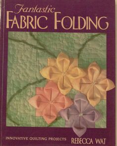 the book cover for fantastic fabric folding, featuring four flowers in different colors and sizes