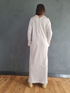 This lovely oversized white knit maxi dress made out of cotton blend knit fabric is perfect for your winter holiday or even earlier. With turtleneck and functional zipper on the back, allows the design and look to change Upgraded edition from the the best seller, with zippers on the sleeves as an accent! This dress will be your best snug piece this two seasons and accompany you for dinner with friends, walk in the park, office days, etc. Offered in many colors to satisfy everyone's' fav.  ✥ SHIP Long Cotton Winter Dress, Beige Long Maxi Dress For Loungewear, Long Cotton Dress For Winter, White Fitted Maxi Dress For Winter, Winter Cotton Maxi Dress With Long Sleeves, Cotton Long Sleeve Maxi Dress For Winter, Winter Long Sleeve Cotton Maxi Dress, White Ribbed Sweater Dress For Winter, Fitted White Maxi Dress For Winter