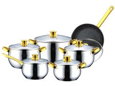 a set of pots and pans with gold handles