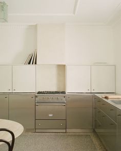 the kitchen is clean and ready to be used as a dining room or office space