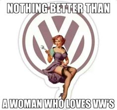 a woman sitting on the back of a volkswagen logo