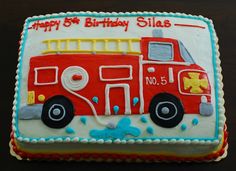 a birthday cake with a fire truck on it