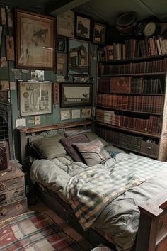 an old fashioned bedroom with bookshelves and pictures on the wall above the bed