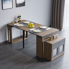 a dining table with plates and bowls on it