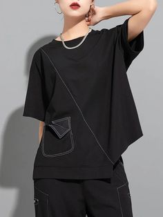 Irregular Black Tops For Spring, Black Irregular Top For Spring, Black Asymmetrical Cotton Top, Black Tops With Asymmetrical Hem, Black Asymmetrical Hem Top For Spring, Casual Summer Tops With Irregular Shape, Black Short Sleeve Crew Neck Top For Work, Casual Irregular Summer Tops, Black Asymmetrical Hem Top For Work