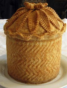 a cake sitting on top of a white plate