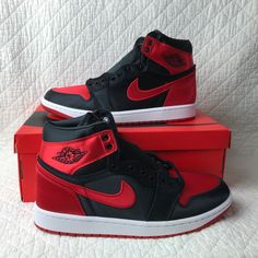 Nike Air Jordan 1 Retro High OG Sneakers Women’s SZ 11.5 'Satin Bred’ FD4810-061 Elevate your sneaker game with these Nike Air Jordan 1 Retro High OG Sneakers in Women's size 11.5. The shoe features a stylish lace-up closure, high-top shoe shaft style, and an alternate red shoelace option. The black, university red, and white colorway and solid pattern make these sneakers a versatile addition to any wardrobe. The sneakers are made with synthetic upper material, fabric lining material, and foam insole material. They are suitable for walking and basketball performance activities. The shoes are part of the Nike Air Jordan product line and are designed with a 90s basketball and retro sports theme. Nike Jordan Lace-up Running Shoes, Jordan Synthetic Shoes With Air Cushioning For Sports, Jordan Mid-top Shoes With Air Cushioning, Mid-top Synthetic Jordan Shoes With Air Cushioning, Lace-up Jordan Shoes With Air Cushioning, Nike Jordan Shoes With Air Cushioning For Sports, Nike Jordan Shoes With Air Cushioning, Nike Jordan Mid-top Synthetic Shoes, Nike High-top Jordan Running Shoes