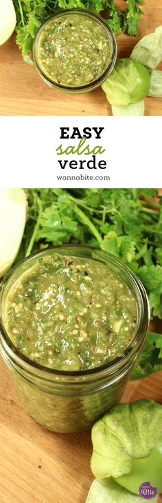 two bowls filled with pesto sauce on top of a wooden table next to lettuce