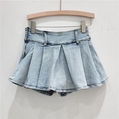 Olivia Mark - High-waisted Denim A-Line Skirt with Pleats and Stylish Detailing Spring High Waist Non-stretch Skort, High Waist Non-stretch Spring Skort, High Waist Medium Wash Cotton Skort, High-waisted Denim Blue Skort For Summer, High Waisted Denim Blue Skort For Summer, High Waist Denim Blue Skort For Summer, Casual Hip-length Mini Skirt For Spring, High Waist Light Wash Stretch Skirt, High-waist Stretch Denim Blue Skort