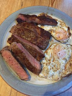 steak, eggs and hash browns on a plate