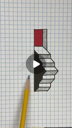 a pencil is next to a piece of paper that has been drawn with squares and rectangles