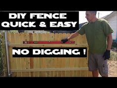 a man standing next to a wooden fence with the words diy fence quick and easy no digging