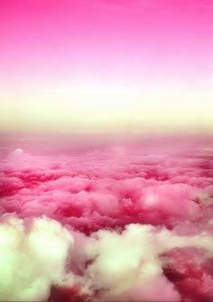 the word hope is above some clouds with pink and white colors in the sky behind it