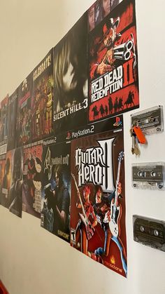 there are many video game posters on the wall