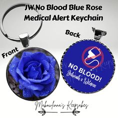 a blue rose with the words, no blood blue rose medical alert keychain back