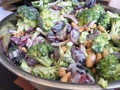 a bowl filled with broccoli and other vegetables