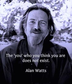 an older man with long hair and a beard smiles at the camera while wearing a black shirt that says, the you've who you think you think you are does not exit