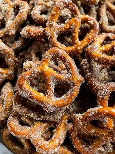 a pile of pretzels covered in powdered sugar