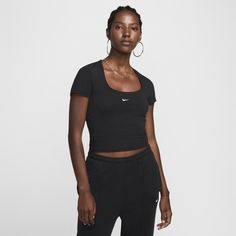 Grounded in style, comfort and versatility, meet our new luxury loungewear. This top's smooth jersey with a slight drape, making it perfect for everyday wear. Ruching on the sides and a square neck emphasize the snug fit. Fitted Black T-shirt For Loungewear, Stretch Elastane Tops For Loungewear, Minimal Stretch Spring Tops In Athleisure Style, Sporty Tops With Minimal Stretch For Layering, Sleek Stretch Tops For Loungewear, Sporty Everyday Elastane Tops, Sporty Scoop Neck Top, Sporty Everyday Tops, Athleisure Tops With Minimal Stretch For Loungewear