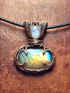 Labradorite and moonstone pendant. Wrapped in bare copper. Oxidized and polished. Comes with 24 inch copper chain and polishing cloth. Moonstone Pendant, Moonstone