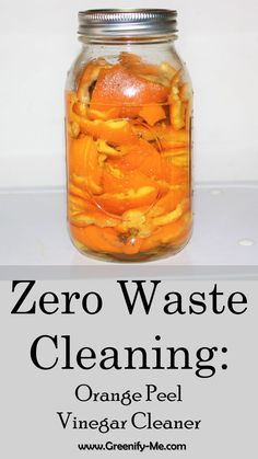 a jar filled with orange peels sitting on top of a white counter next to the words zero waste cleaning