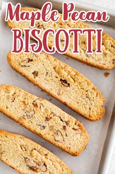 four slices of maple pecan biscotti on a baking sheet with text overlay