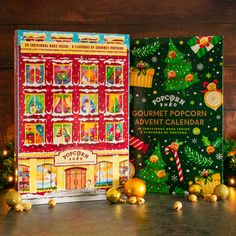 an assortment of christmas decorations and books on a table