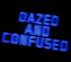 the words dazed and confused are lit up in blue