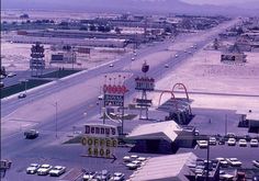 an aerial view of a motel and parking lot