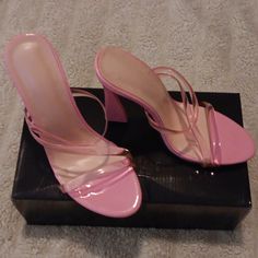 Never Worn Pink Heels With Clear/Pink Straps. The Heel Is About 2 Inches And Adds Extra Style To The Heel. These Are A Size 6, And There Great To Wear To A Party, Special Event, Work, Or Just To Add Sexy To An Outfit! Pink Clear Heels, High Heel Pink Heels For Summer, Pink High Heel For Summer, Pink High Heel Heels For Summer, Pink High Heels For Summer, Trendy Pink Open Toe Heels, Pink Synthetic Heels For Party, Feminine Pink Heels, Pink Feminine Synthetic Heels